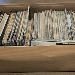 A shoe box of photos.